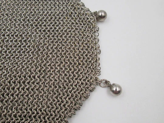 Sterling silver double mesh purse. Half moon clutch frame. Balls clasp. 1930's. Europe