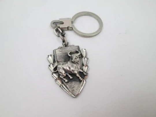 Sterling silver keychain. Bullfighting Festival triangular shield. Angry bull. 1978