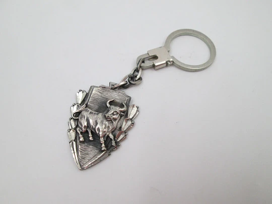 Sterling silver keychain. Bullfighting Festival triangular shield. Angry bull. 1978