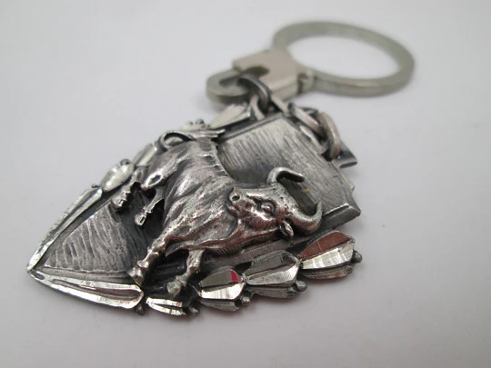 Sterling silver keychain. Bullfighting Festival triangular shield. Angry bull. 1978