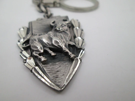 Sterling silver keychain. Bullfighting Festival triangular shield. Angry bull. 1978