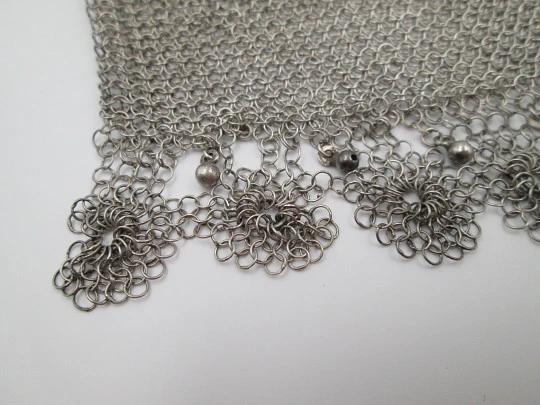 Sterling silver mesh bag. Openwork clutch frame. Vegetable motifs. Europe. 1920's