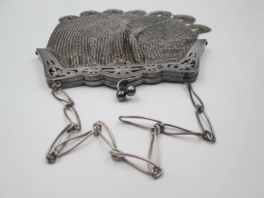 Sterling silver mesh bag. Openwork lobed clutch frame. Flowers chiseled. Europe