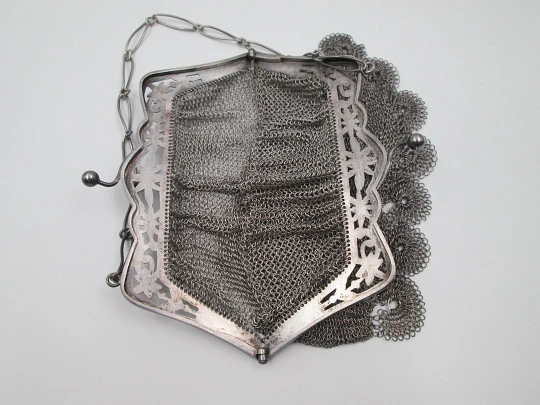 Sterling silver mesh bag. Openwork lobed clutch frame. Flowers chiseled. Europe