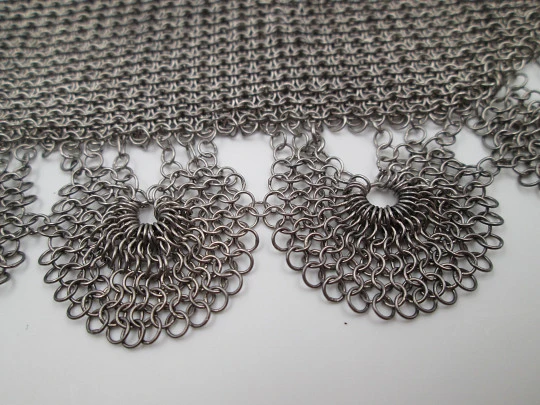 Sterling silver mesh bag. Openwork lobed clutch frame. Flowers chiseled. Europe