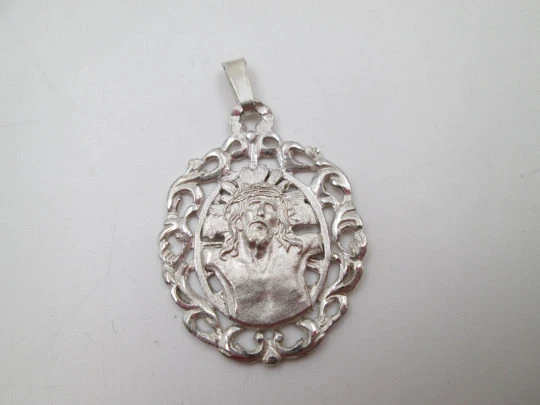 Sterling silver openwork medal. Christ bust with crown and radiance. Europe. 1970's