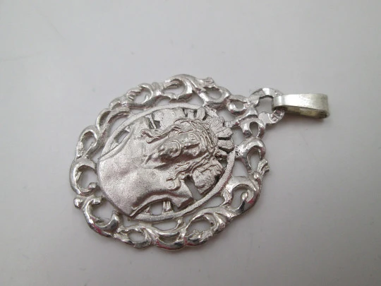 Sterling silver openwork medal. Christ bust with crown and radiance. Europe. 1970's