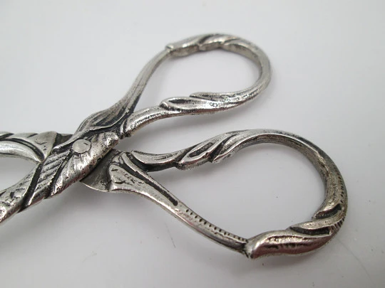 Sterling silver ornate ice tongs. Vegetable motifs and scrolls. 1960's. Spain