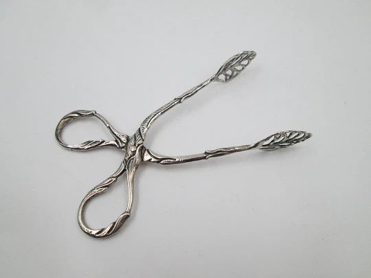 Sterling silver ornate ice tongs. Vegetable motifs and scrolls. 1960's. Spain