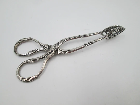 Sterling silver ornate ice tongs. Vegetable motifs and scrolls. 1960's. Spain