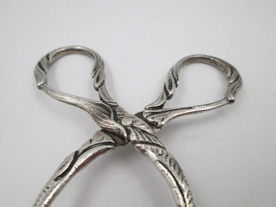 Sterling silver ornate ice tongs. Vegetable motifs and scrolls. 1960's. Spain