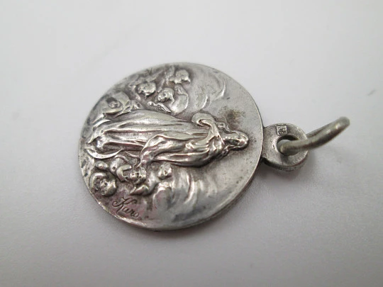 Sterling silver religious medals. Sacred Heart of Jesus and Virgin with Crescent Moon. 1920's Sterling silver religious medals. Sacred Heart of Jesus and Virgin with Crescent Moon. 1920's