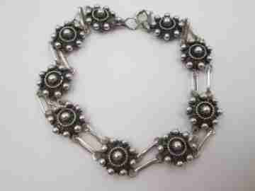 Sterling silver women's bracelet. Openwork charro buttons. 1980's. Spain