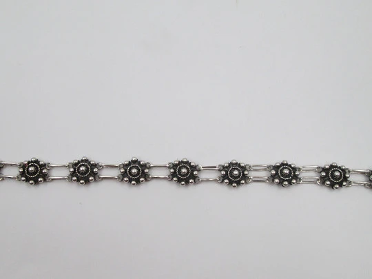 Sterling silver women's bracelet. Openwork charro buttons. 1980's. Spain