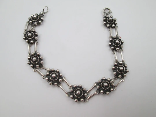 Sterling silver women's bracelet. Openwork charro buttons. 1980's. Spain