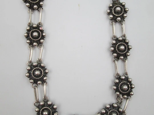 Sterling silver women's bracelet. Openwork charro buttons. 1980's. Spain