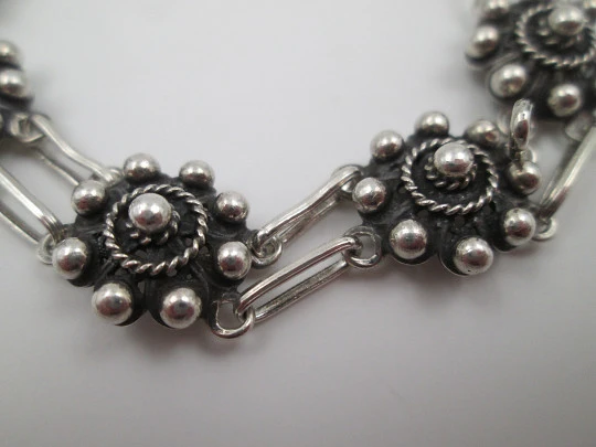 Sterling silver women's bracelet. Openwork charro buttons. 1980's. Spain