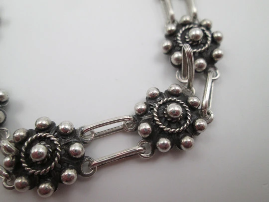 Sterling silver women's bracelet. Openwork charro buttons. 1980's. Spain