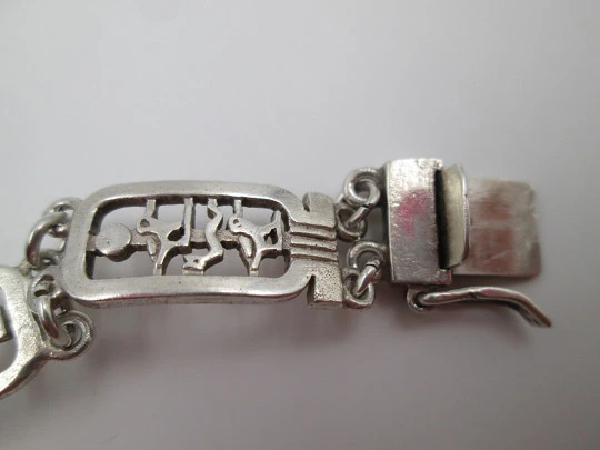 Sterling silver women's bracelet. Openwork egyptian motifs. 1990's