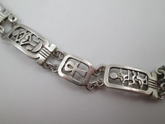 Sterling silver women's bracelet. Openwork egyptian motifs. 1990's