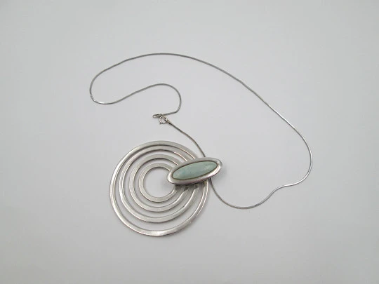 Sterling silver women's necklace. Concentric circles pendant with cord. Blue stone. 1980's