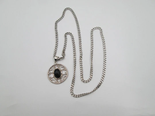 Sterling silver women's necklace. Curb link chain and openwork pendant with black gem