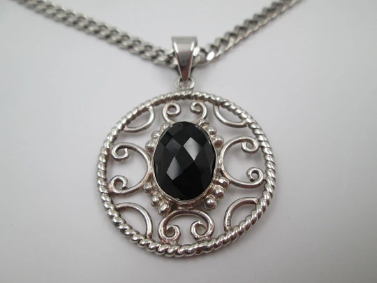 Sterling silver women's necklace. Curb link chain and openwork pendant with black gem