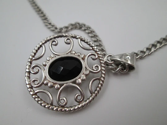 Sterling silver women's necklace. Curb link chain and openwork pendant with black gem