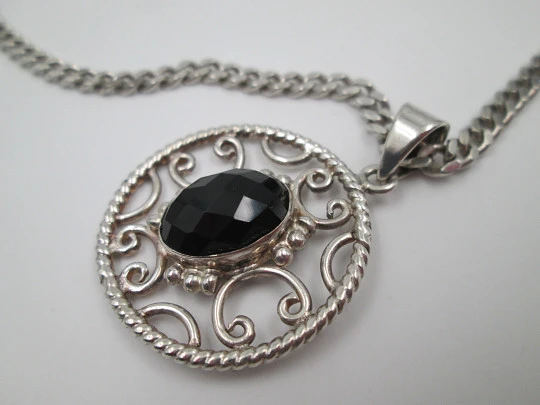 Sterling silver women's necklace. Curb link chain and openwork pendant with black gem
