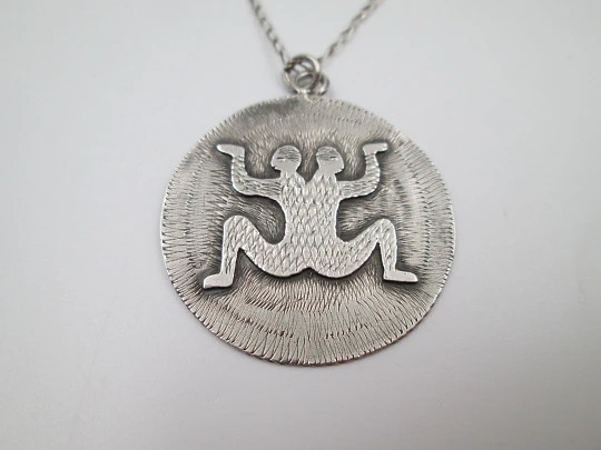 Sterling silver women's necklace. Open links chain and symbol round pendant. 1980's Sterling silver women's necklace. Open links chain and symbol round pendant. 1980's