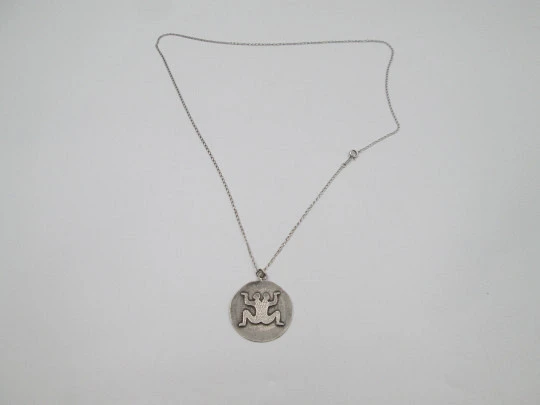 Sterling silver women's necklace. Open links chain and symbol round pendant. 1980's Sterling silver women's necklace. Open links chain and symbol round pendant. 1980's