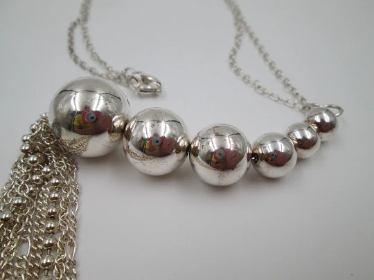 Sterling silver women's necklace. Six spheres. Chains tassel. 1980's