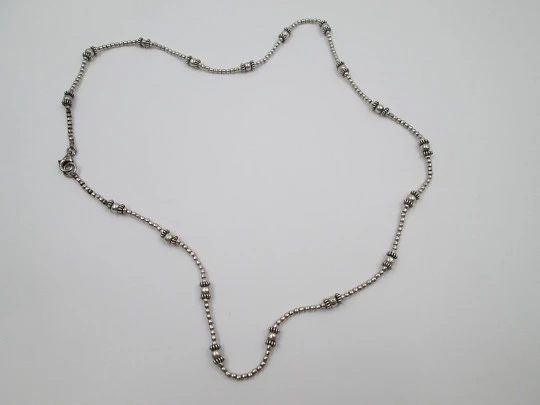 Sterling silver women's necklace. Spheres and circular ornaments. Europe. 1970's