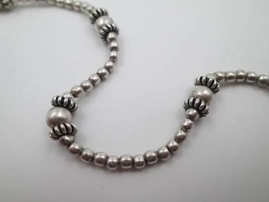 Sterling silver women's necklace. Spheres and circular ornaments. Europe. 1970's