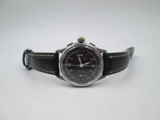 Swiss chronograph. Stainless steel & metal. 1940's. Manual winding. Black dial