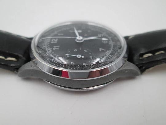 Swiss chronograph. Stainless steel & metal. 1940's. Manual winding. Black dial