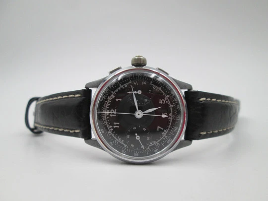 Swiss chronograph. Stainless steel & metal. 1940's. Manual winding. Black dial