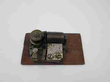 Swiss music box mechanism. Wind up movement. Wood stand. 1940's