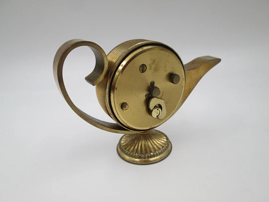 Swiza 8 days desk table alarm clock. Manual winding. Bronze. Oil lamp shape. 1970's