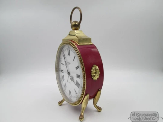 Swiza 8 days. Hand winding. 15 jewels. Bronze & red lacquer. Alarm clock