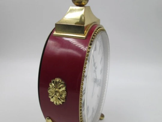 Swiza 8 days. Hand winding. 15 jewels. Bronze & red lacquer. Alarm clock