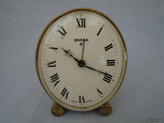 Swiza 8 days. Manual winding. Bronze. Alarm. Legs. 1970's