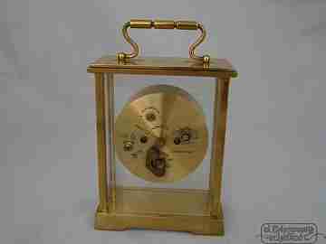 Swiza 8 días. Cuerda manual. Bronce. Argolla. Alarma. 1970