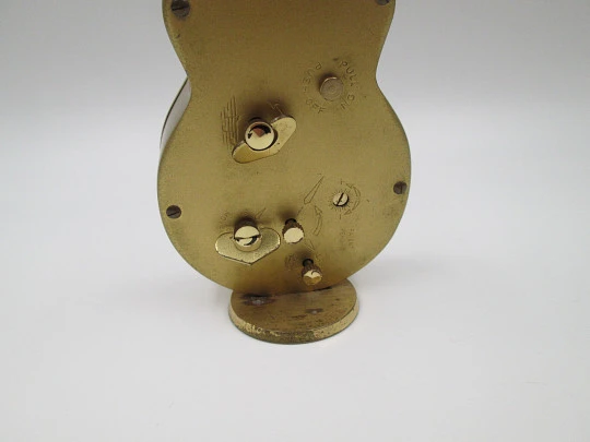 Swiza musical table alarm clock. Hand winding. Bronze. Sheffield guitar shape. 1970's