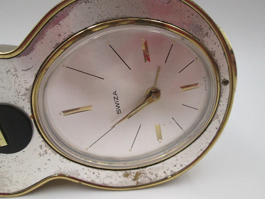 Swiza musical table alarm clock. Hand winding. Bronze. Sheffield guitar shape. 1970's