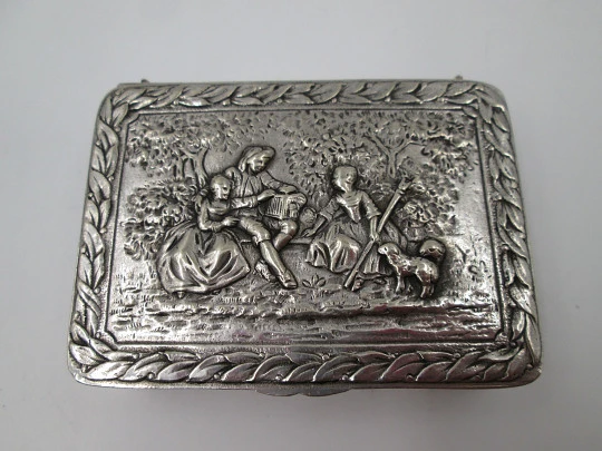 Table / desk box. Silver plated metal. Relief romantic scene. Europe. Articulated lid. 1940's