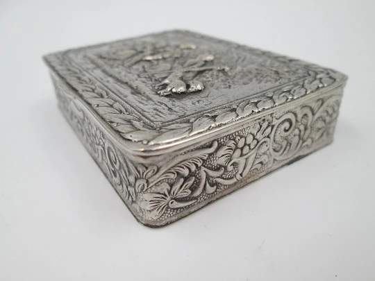 Table / desk box. Silver plated metal. Relief romantic scene. Europe. Articulated lid. 1940's