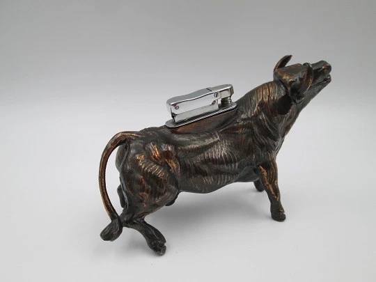 Table desk petrol lighter. Brave bull shape. Bronze and silver plated. Europe. 1970's