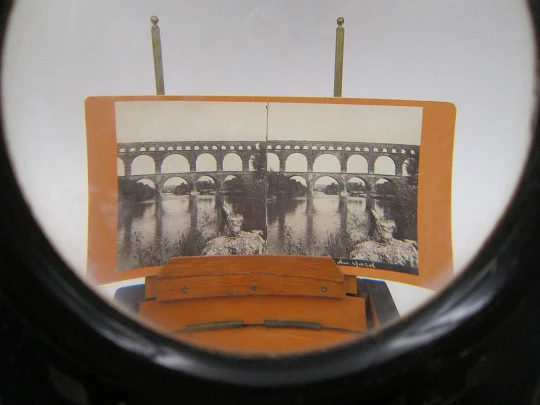 Table / desk stereoscope. Black lacquered wood and brass details. Europe. 1890's
