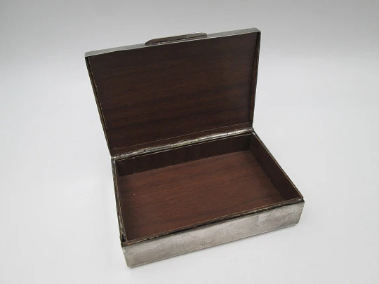 Table desk tobacco case. White alpaca. Articulated lid. Inca idol motif. 1980's